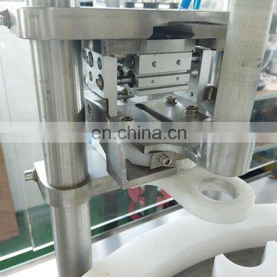 Nice Quality Automatic 4 Heads Glass Bottle Filling and Capping Machine photo-5