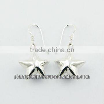 Enchanting Silver Dangle Earrings Puffed Stars