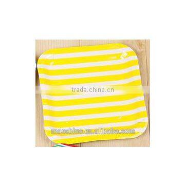 White color square shape paper plate with yellow color streak pattern