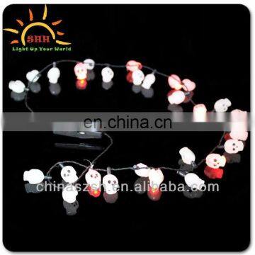 Skull shaped glowing LED flashing necklace for Halloween