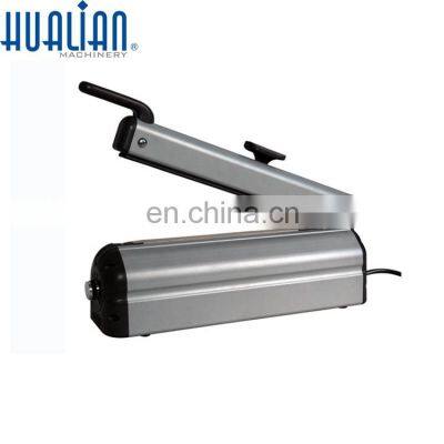 FSC-220 Hualian Best Hand Sealer with Cutter Bags Cartons 2.5 200 75