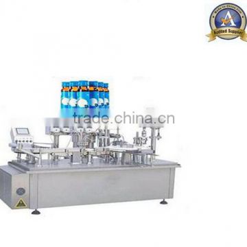 Automatic liquid filling and capping machine