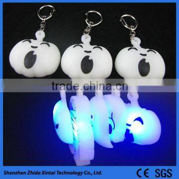 embossed cute pumpkin shape silicone led light keychain