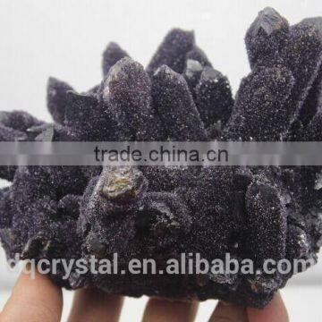 Natural pyramid end prism dark amethyst crystal cluster covered with rime