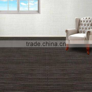 Wear resistant woven vinyl flooring in carpet