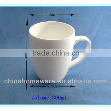 white porcelain ceramic mug