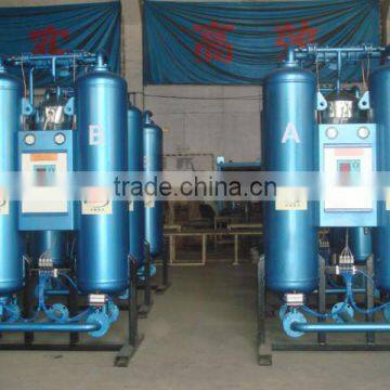 Heat regeneration compressed air dryer