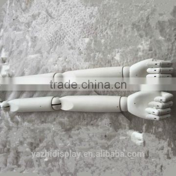 White wooden mannequin arm use for dress form