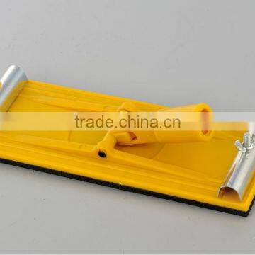 Sanding block with rotary handle