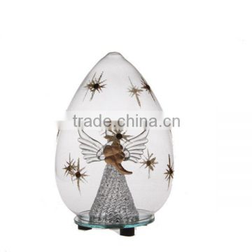 clear glass angel ornament in christmas tree decoration