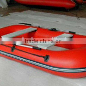 Red Drifting Boat with one pair of oars for summer sport