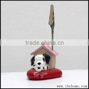 Cute sleeping dalmatian in house photo clip holder