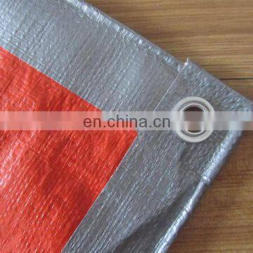 orange color finished size tarp. 2*3m tarpaulin sheet with eyelets.