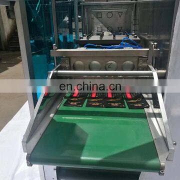 Shenhu Multifunction 4 Side Sealing Fish Type Kf94 Face Mask Packing Machine photo-4