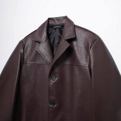 New women's vintage loose casual long-sleeved pocketed faux leather blazer with collar.