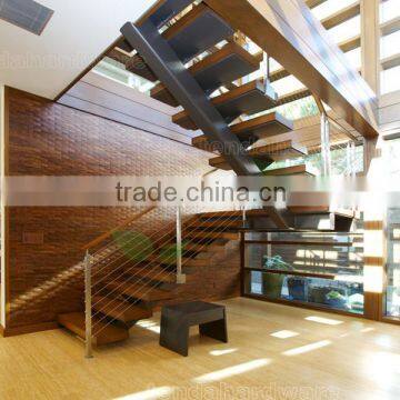 blackened mono spine U shape staircase with cable balustrade