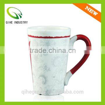 white ceramic coffee mug with big handle