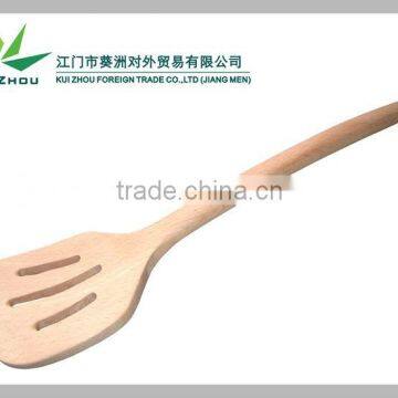 Big slotted wooden spatula