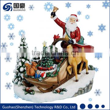 Regal Santa in sleigh with reindeer figurine