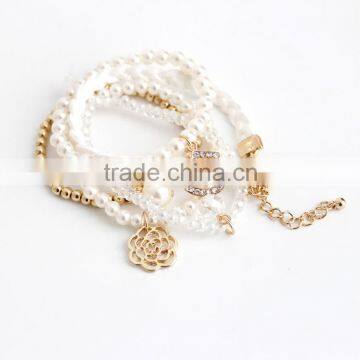 fashion pearl bracelet with small charms