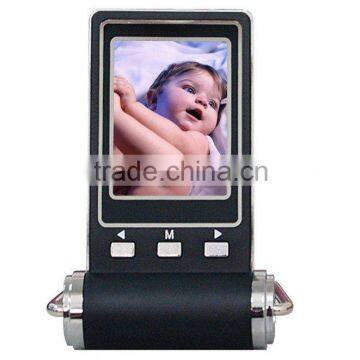 2.4 inch digital photo frame on desk