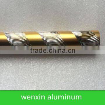 gold curved aluminum curtain rod