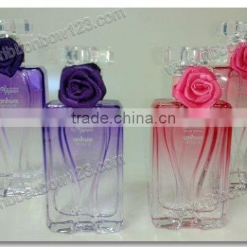 designs of ribbon flowers for perfume bottle