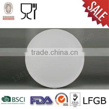 White solid color round melamine flat plate set