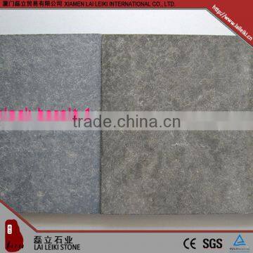 Factory direct price bush hammered basalt rock for sale