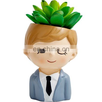 Hot green plant decorated cartoon boy resin flowerpot decoration