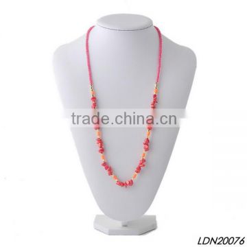 Red acrylic and stone pendant necklace with matching earrings and bracelet                        
                                                                                Supplier's Choice