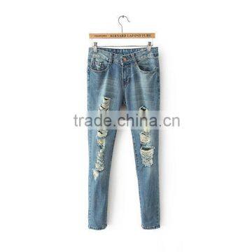 Girls fashion design light blue washed hole jeans ripped long denim jeans