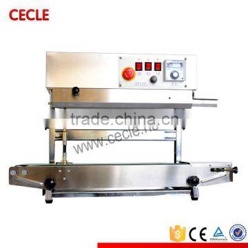 Continuous automatic aluminum foil sealing machine