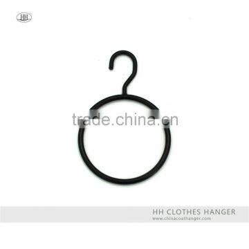 The HEAD metal black circular hanger allows scarves to be stored by threading them through the ring,scarf hanger