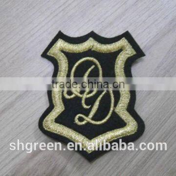 Gold metallic thread making emboridery patch/emblem