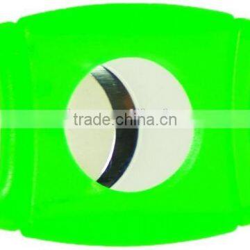 green plastic cigar cutter
