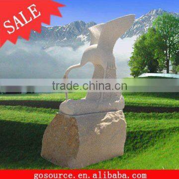 stone animal bird carving