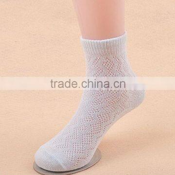 Plain white hollow jacquard breathable children socks