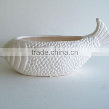 white ceramic fish flower planter