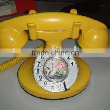 Yellow Rotary dial telephone