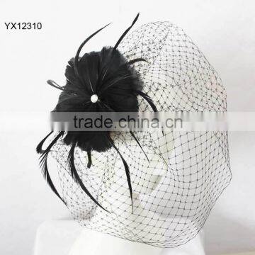 Black feather fascinator with birdcage veil on metal headband