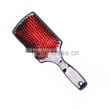 plastic paddle and cushion hair brush with pocupine