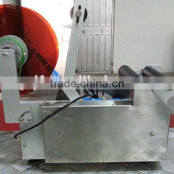 Semi-automatic Xylitol Round Wine Bottle Labeling Machine photo-2