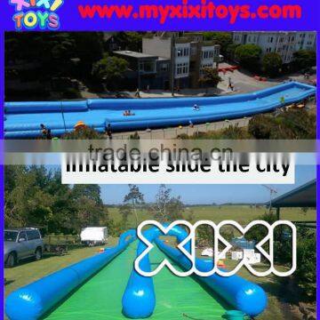 Longest inflatable slip n slide the city in street