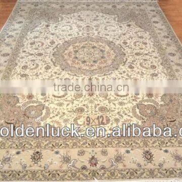 9x12ft hand made wool and silk ivory rugs