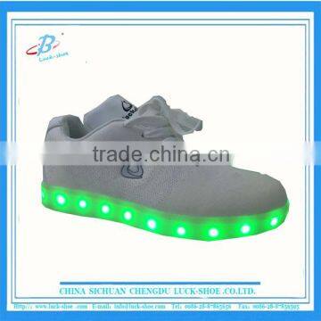 Fashionable white flyknit led light running shoes light and soft for men and women kids runners