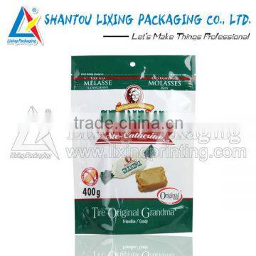 Confectionery stand up pouch with zipper