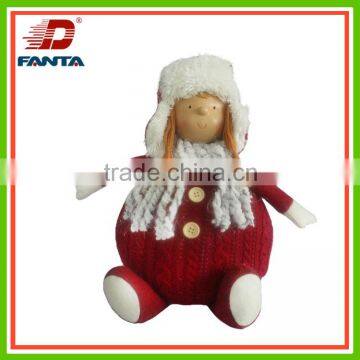 Nice cutie clothware sitting girl with hat with scarf for Christmas decoration