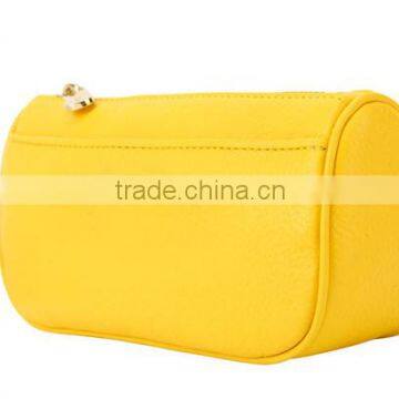 Yellow leather cosmetic bag special shape metal LOGO Since 1997