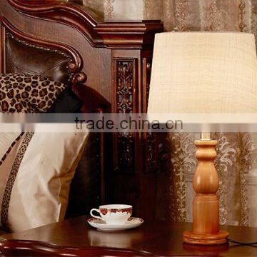 natural wood table light with white empire lampshade